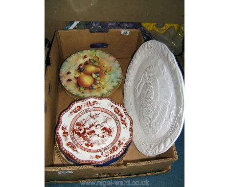 A quantity of plates to include three from The London and Staffordshire China company signed D. Wallace along with Royal Doul