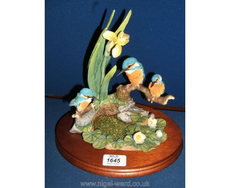A Chiltern Border Fine Arts model of three Kingfishers.