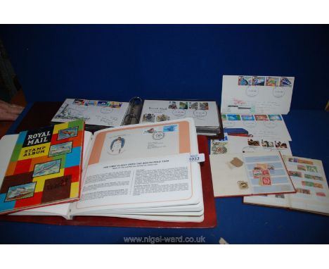 A stamp album of Commonwealth First Day Covers, a GB FDC album and two small stock books.
