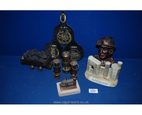 A quantity of Welsh related items including a coal wagon, miner's lamp, horse brasses, Caernarvon spill vase, etc.