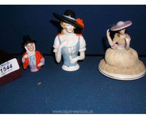 A half Pin cushion Doll 4" high, a smaller Welsh Pin cushion Doll and a Pot lid with half Doll