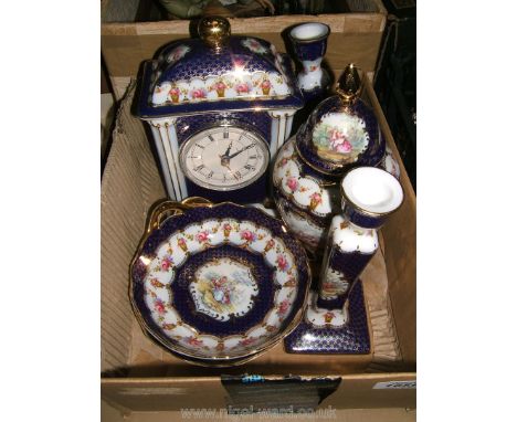 Six pieces of Past Times china including clock, bowls, candlestick, etc.