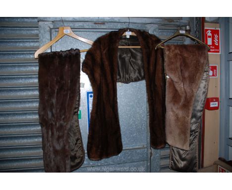 Three Fur Stoles, two dark brown, one light brown colour
