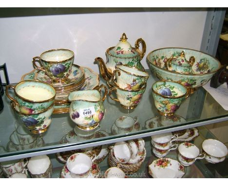 A Lime House Studio China 'Princess Royal' fruit decorated Teaset with Cake Plates, Dinner Plates and Fruit Bowl, signed R. E