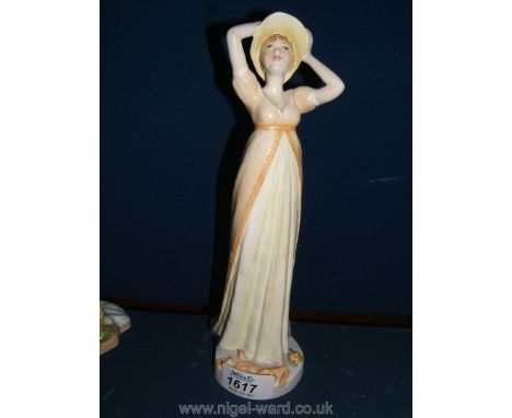 A Royal Worcester figure 'Elizabeth Benett' from the Jane Austin collection.