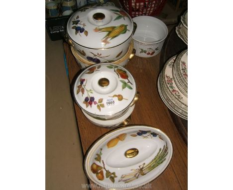 A quantity of Royal Worcester 'Evesham' tableware including lidded casserole dishes, oval serving dish, souffle dish, etc.
