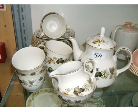 A Royal Doulton "Larchmont" pattern part Teaset including twelve plates, four saucers, teapot, six cups and a bread/butter pl