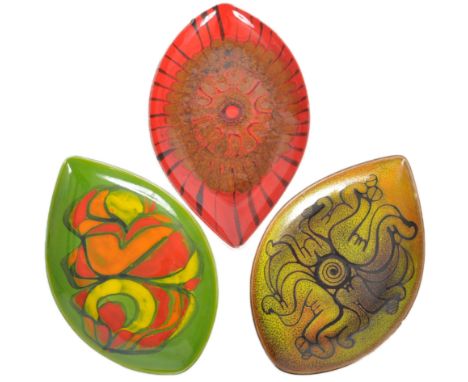 Poole Pottery - Delphis Range - A selection of three retro mid 20th Century teardrop shaped dishes / plates, each with glazed