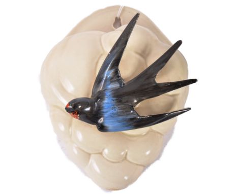 Clarice Cliff - A vintage 20th Century 1930s Art Deco wall pocket adorned with a Swallow to the front with hand painted detai