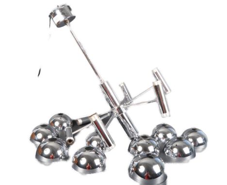A retro 20th Century hanging ceiling light / chandelier having a single central chrome stem with ceiling bracket and series o