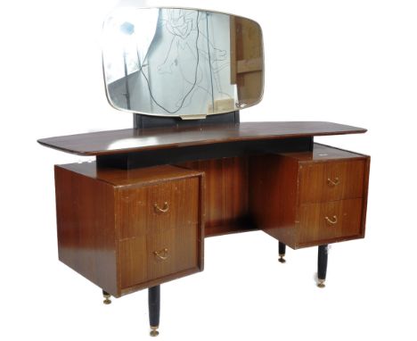 E Gomme - G Plan Furniture - Librenza&nbsp; - A retro vintage mid 20th Century tola wood chest of drawers having a four drawe