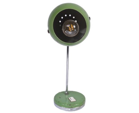 A retro vintage mid 20th Century green eyeball spot light lamp / desk lamp. Green eyeball shade with chrome column over circu