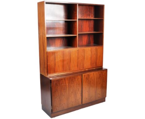 A retro mid 20th Century Danish teak two part bookcase having a stepped open shelf top with fall front bureau / cocktail drin