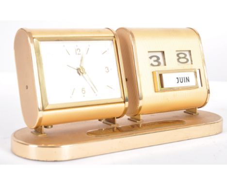 Europa - A retro mid 20th Century desk clock and calendar having two separate section with brass effect cases with the calend