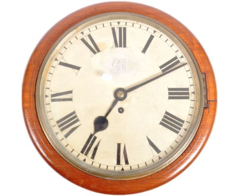 An early 20th Century mahogany case fusee type wall clock having a cream painted dial with Roman numerals and GRV beneath a K