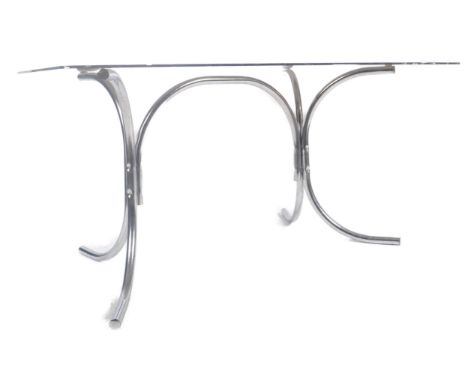 A retro vintage 20th Century British design chrome and smoked glass top dining table having a rounded edge rectangular smokie