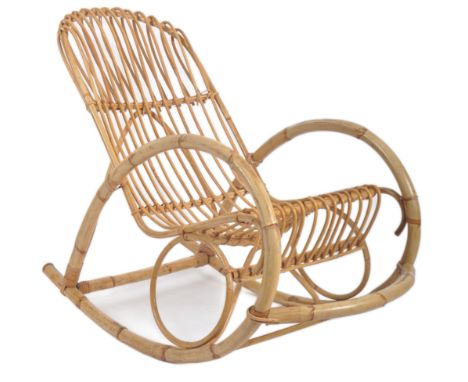 Manner of Franco Albini - A retro vintage mid 20th Century Boho Bamboo rocking chair / armchair. Shaped rail back with circul