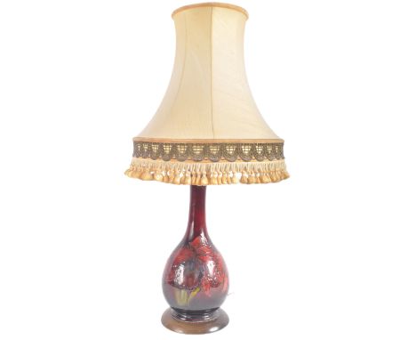 Moorcroft Pottery - A vintage 20th Century hand painted ceramic table lamp light having a slender neck over a bulbous body ra