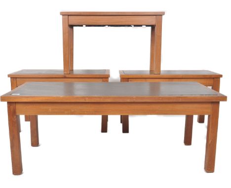 A retro mid Century living room suite comprising of a large coffee table / low table and three matching occasional side table