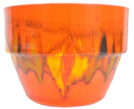 Poole Pottery - Delphis Range - A retro mid 20th Century ceramic plant pot / planter of tapering barrel form with glazed deco