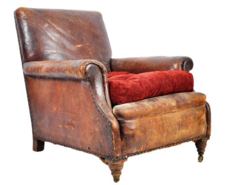 A vintage 20th Century 1930s Art Deco leather club / chesterfield armchair. Dark brown leather upholstery with barrel arms an