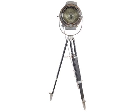 A large Contemporary ships style spotlight lamp having a polished metal case with ribbed glass plate to the centre. The spot 