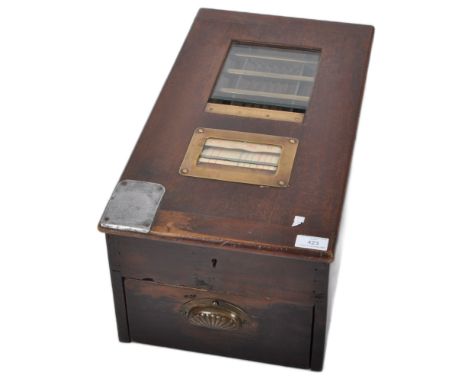 Gledhills &amp; Sons -&nbsp;A 19th Century Victorian oak cased cash register / till having a pull out lower shelf with sectio