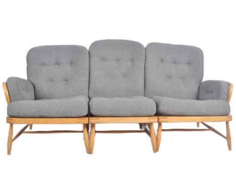 Lucian Ercolani - Ercol - Jubilee Range - A retro vintage 20th Century beech framed three part modular sofa settee having spi