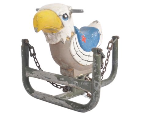 Wicksteed - A vintage 20th Century fairground / funfair carousel ride in the form of an American eagle supported upon a tubul