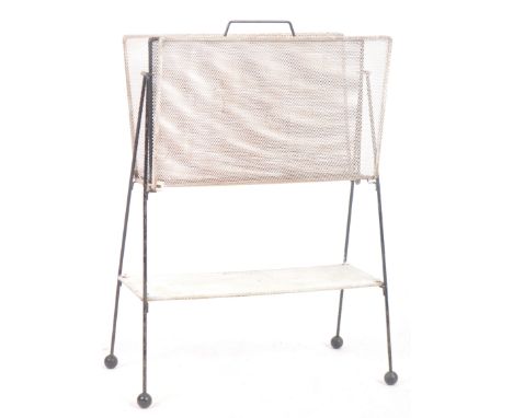 Mathieu Mategot - A retro mid 20th Century perforated metal magazine rack of slender upright form with sloping panels to the 