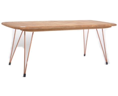 Ercol - A retro mid 20th Century stripped elm topped coffee table / low table raised on four rose gold coloured hairpin suppo