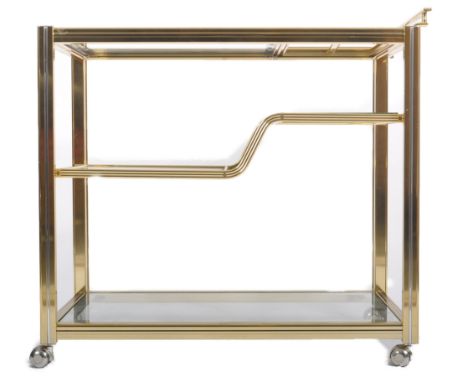 A Contemporary designer brass effect three tier drink / cocktail trolley having a reeded framed with handrail to one end with