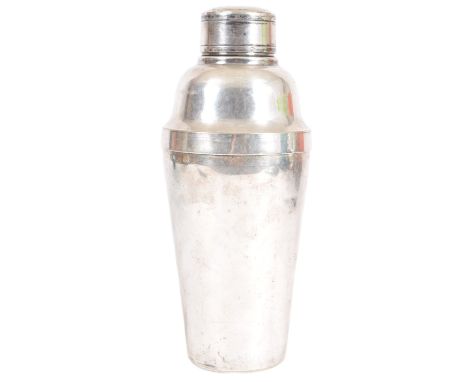 A vintage 1930s Art Deco silver-plated cocktail drinks shaker. The cocktail shaker having a removable turned lid atop a shape