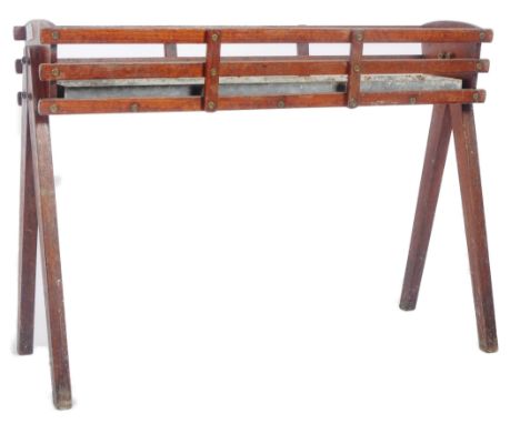 A retro vintage 20th Century teak wood plant stand / planter having a slatted teak wood body with galvanised tray within. All