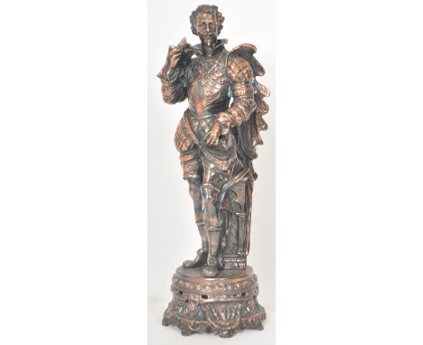 A retro vintage 20th Century copper effect figure of medieval soldier in full armour raised on a decorative circular base. Me