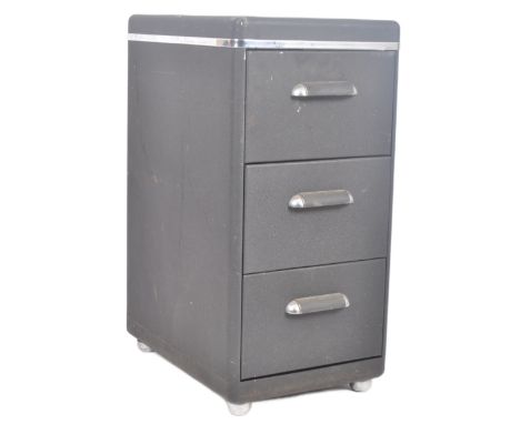 A vintage 20th Century Art Deco metal and chrome filing cabinet chest of upright pedestal form with pull out slide to the rig