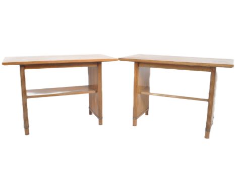 A matching pair of vintage 20th Century 1930s Art Deco walnut side occasional table / lamp tables with each having rectangula
