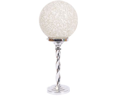 An early 20th Century Art Deco chrome and glass table lamp light having a mottled glass ball shade raised upon a twisted chro