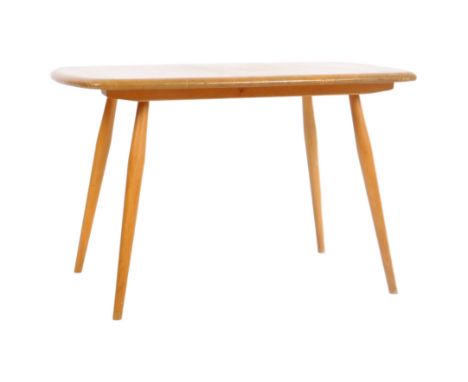 Lucian Ercolani - Ercol - A retro vintage mid 20th Century beech &amp; elm coffee table / low table having a chamfered edge r