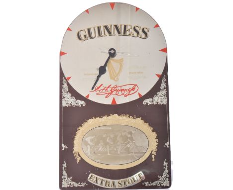 Guinness - A retro 20th Century pub / bar point of sale advertising clock / mirror for Guinness Extra Stout having a mirrored