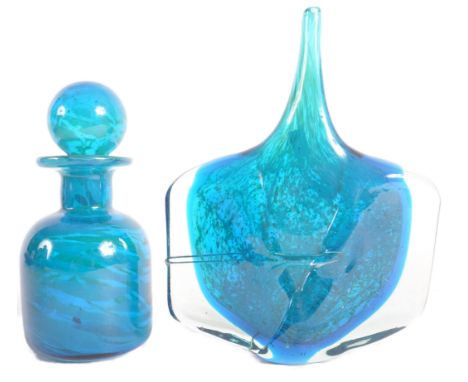 Mdina - Two pieces of 20th Century studio art glass comprising an Axe head vase in blue and a similar bottle decanter with ro
