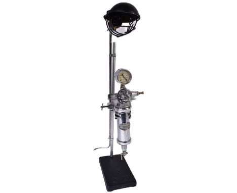 A retro vintage 20th Century steam punk industrial work desk lamp light. Constructed from various machine parts including an 