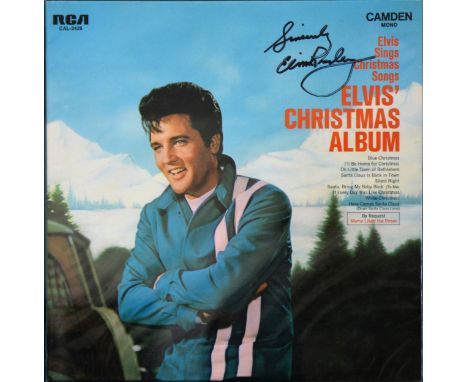 Elvis Presley; signed 1970 Christmas LP album; framed and glazed, 40x83cm. Provenance; the signature was collected at the Las