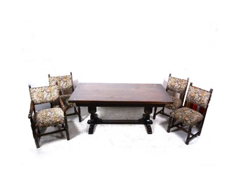 A reproduction stained oak dining room suite, comprising draw-leaf refectory type dining table, bulbous supports, stretcher b