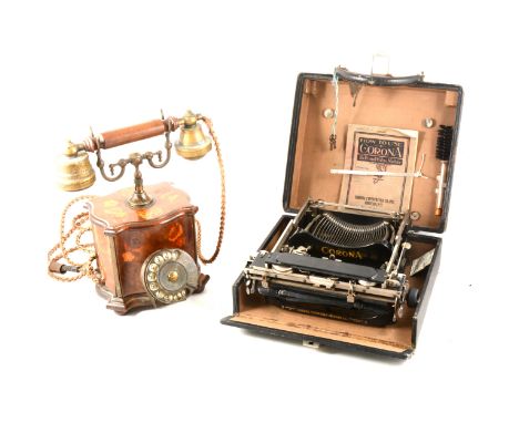 A vintage telephone by Telcer, Italia, floral inlaid wood design to case, wood and brass handle, brass circular dial, and a v