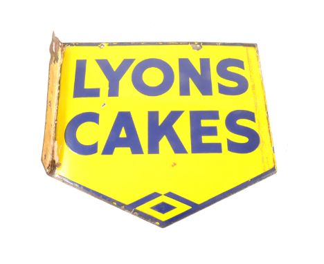 A vintage enamel double-sided shop sign, Lyons Cakes, c1910-1920, yellow ground, blue text, 39.5cm x 44cm.