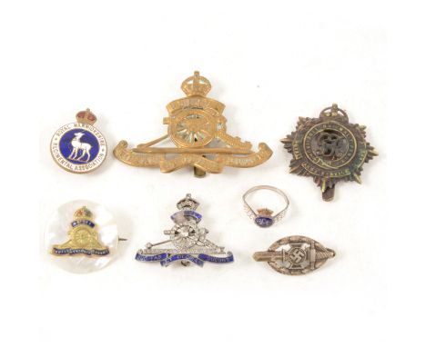 WWII Royal Artillery 'Jewelled Sweetheart Brooch', an RAF ring, a R.A. Sweetheart brooch, a WWII German lapel badge, two cap 