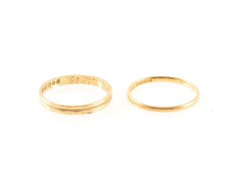 A 22 carat gold wedding band, 1mm wide D shape, approx. 1.2gms, ring size M1/2, and an 18 carat gold wedding band, 2mm wide, 