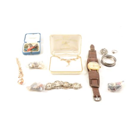 9ct. gold rope link bracelet, a 9ct. Cameo ring, a pendant marked 14k. together with a silver napkin ring, an Egyptian bracel