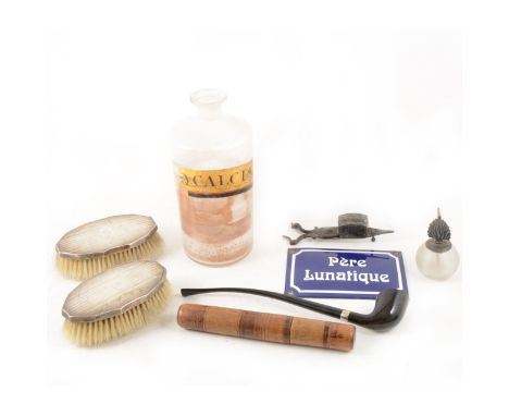 A pair of silver-backed hairbrushes by Daniel Manufacturing Company, Birmingham 1933, four silver-handled forks, a silver pic